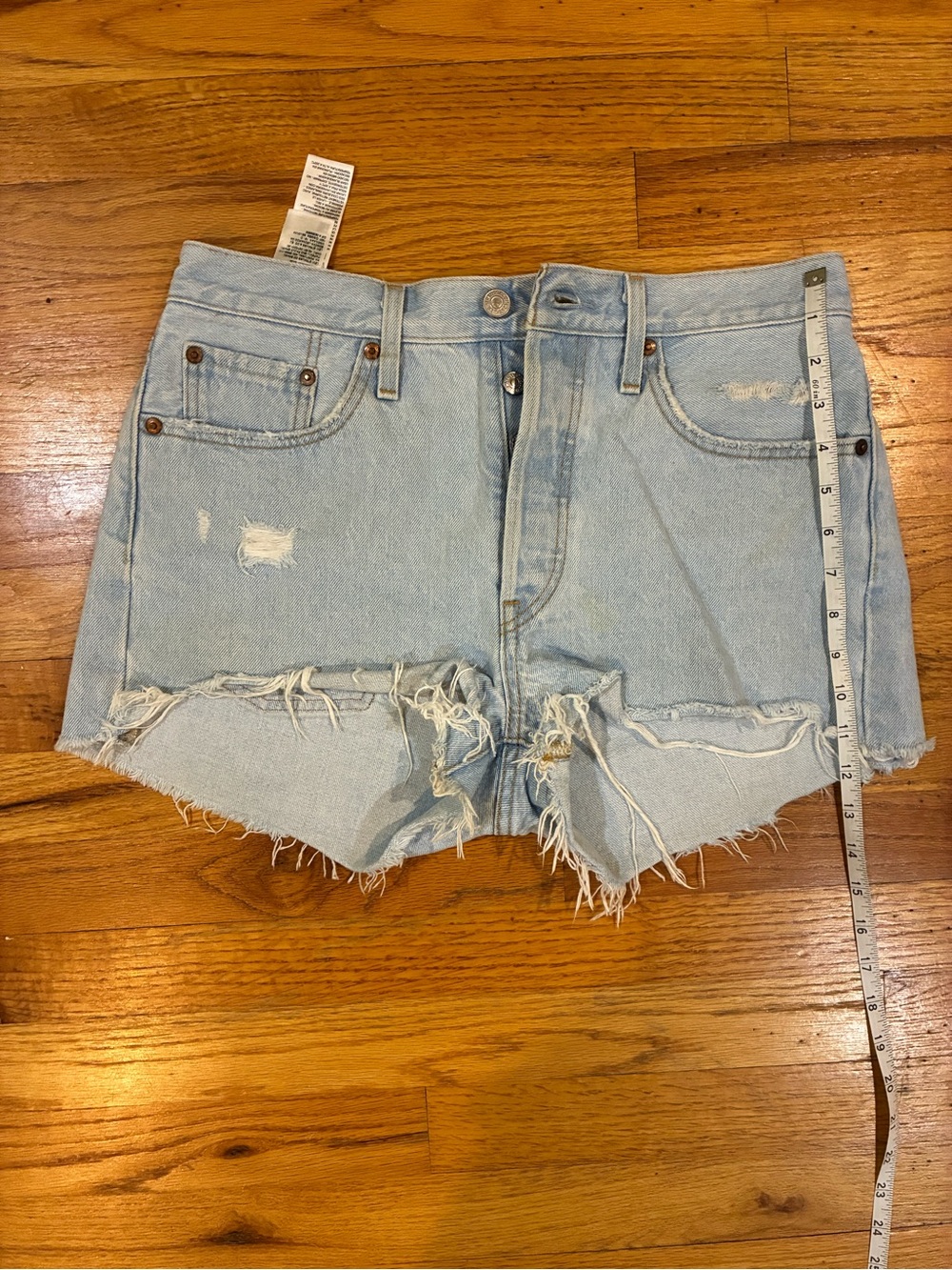 High-Rise Distressed Light Blue Denim Shorts - Levi’s
